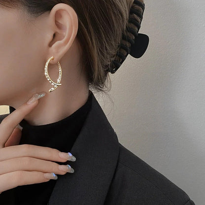 EarGlow™ – Auffällige Ohrring-Bogen-Statement [1 + 1 Gratis]