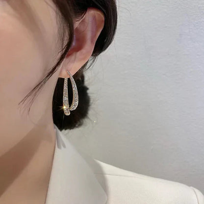 EarGlow™ – Auffällige Ohrring-Bogen-Statement [1 + 1 Gratis]