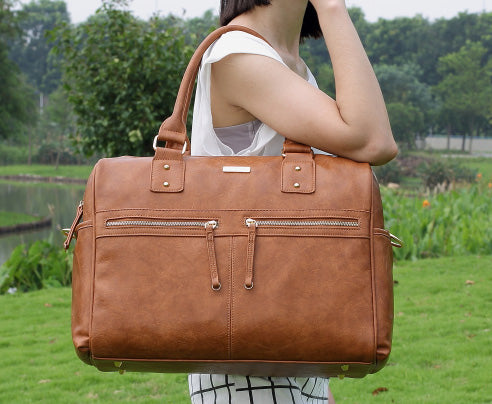 Aradia | Multifunktionaler Wickelrucksack mit Zubehör