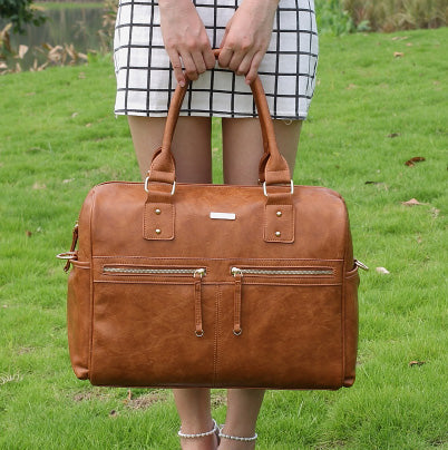 Aradia | Multifunktionaler Wickelrucksack mit Zubehör
