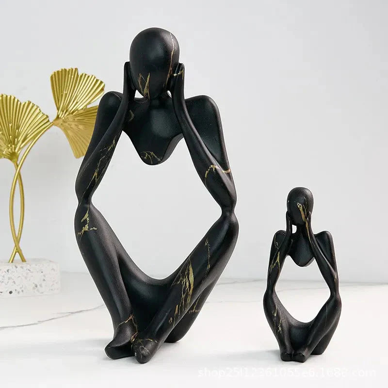 Large and small Abstrakte Denker Skulptur in matching black marble finish