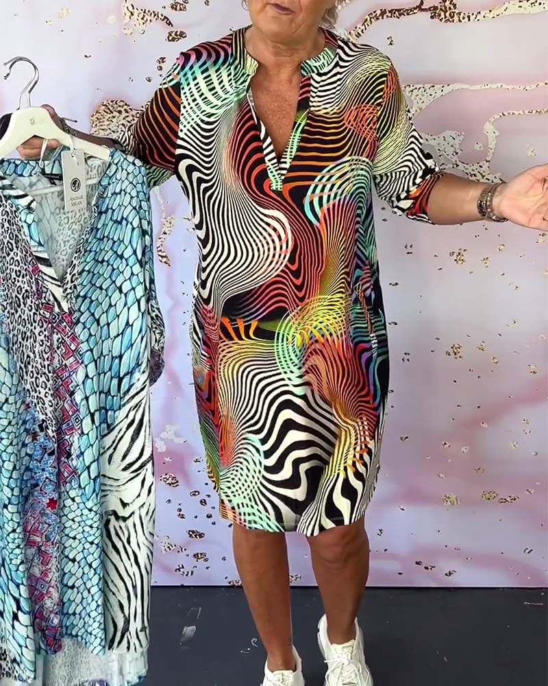 Evandria | Farbenfrohes Kleid mit V-Ausschnitt